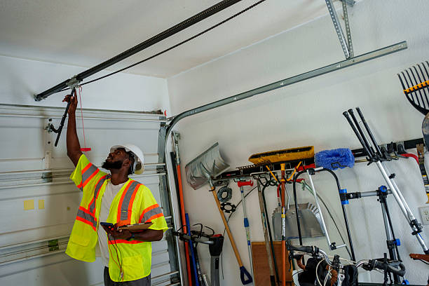 Professional Garage Door Panel Replacement technician working in Wagoner County County, OK
